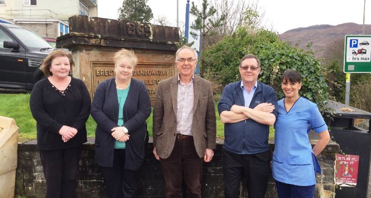 Boyd Robertson with staff on a visit to Belford Hospital