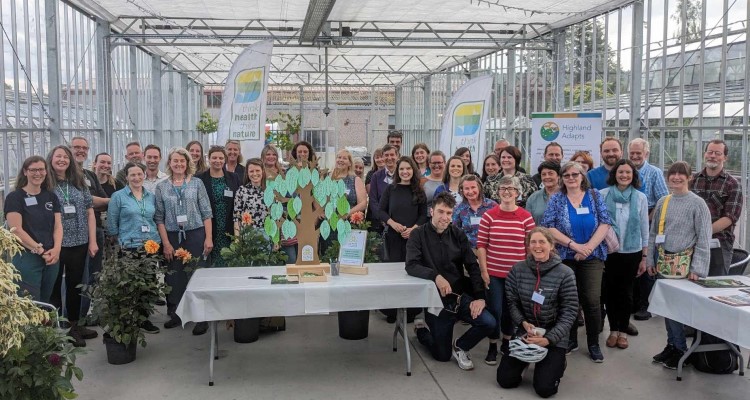 Highland Charter For Climate, Nature And Health Participants In A Greenhouse