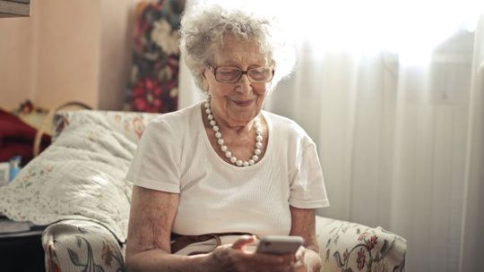 Woman Looking At Phone